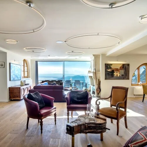 LIEHT Lichtplanung Villa am Genfersee: Sitzbereich mit Panoramablick